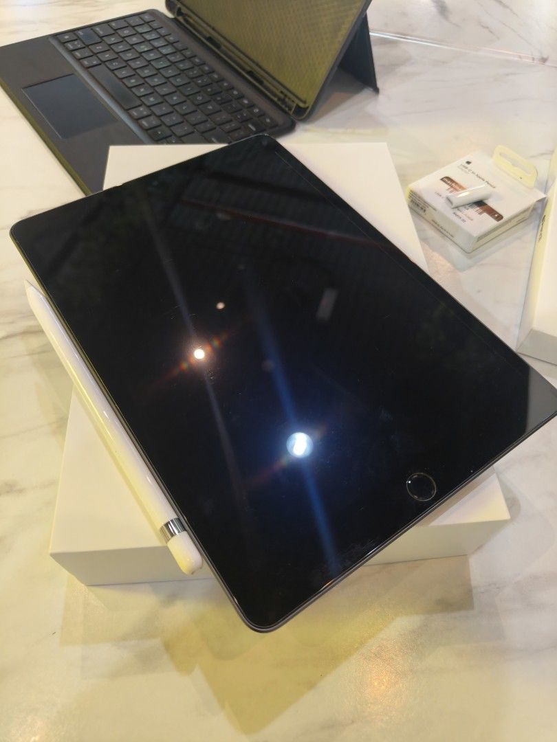 Ipad 9th generation (Category: iPad) located in Simpang Ampat. Submitted by mysura.m (Listing ID 1464802432, Image 2). Description: include all accessories. ipad used rarely and in perfect condition like new. accessories are: ipad cover with keyboard, apple pencil 1st generation, charging socket for apple pencil, charging plug and cable. item are include original box. slightly nego. penang area or KL area..