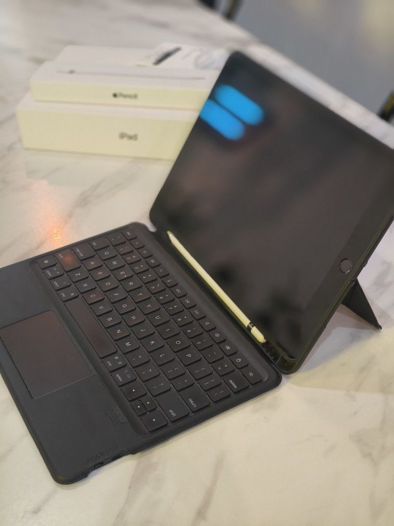 Ipad 9th generation (Category: iPad) located in Simpang Ampat. Submitted by mysura.m (Listing ID 1464802432, Image 3). Description: include all accessories. ipad used rarely and in perfect condition like new. accessories are: ipad cover with keyboard, apple pencil 1st generation, charging socket for apple pencil, charging plug and cable. item are include original box. slightly nego. penang area or KL area..