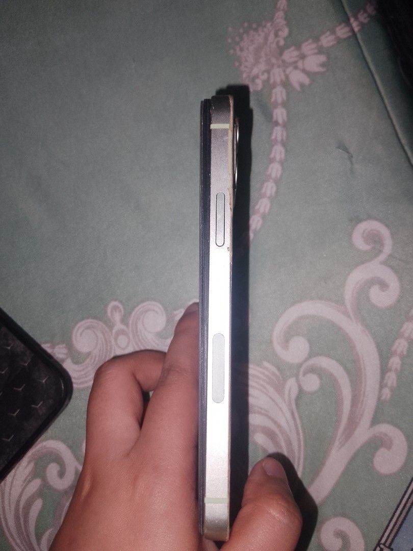 Iphone12- 128gb (Category: iPhone 12 Series) located in Manila. Submitted by khatlyn_kaye (Listing ID 1464877163, Image 3). Description: For sale po iphone12 128gb. basag po backglass and nastock po di na naipagawa. lumobo na battery kaya nasira lcd pero if ipapagawa po working pa sya.