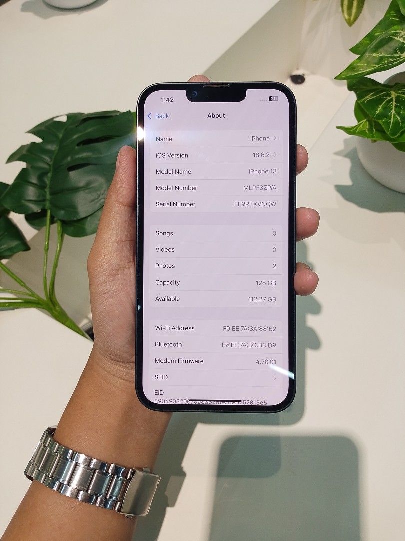 IPhone 13/128GB (Category: iPhone 13 Series) located in Quezon City. Submitted by emem_00 (Listing ID 1464848469, Image 3). Description: - Model: iPhone 13 - Storage: 128GB - Color: Midnight - Battery Health: 85% - Condition: Pre-loved, well-maintained, clean body and screen - Software: Updated to latest iOS.