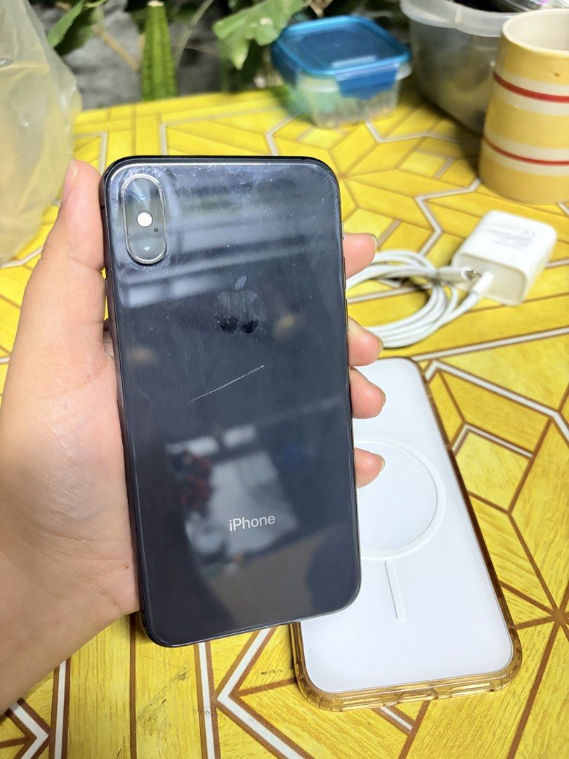 iPhone X 64GB — BLACK (Category: iPhone X Series) located in Dasmarinas. Submitted by andrae03 (Listing ID 1464927056, Image 2). Description: iPhone X 64GB — BLACK - Battery health: 85% - iOS 16.7.16 - LL/A Variant - Openline and No History of Repair - Face ID ✅ - True Tone ✅ - All Buttons and speaker working - Issue: Scratch sa screen pero nakatempered na. No Ghost Touch 📍Dasmariñas.
