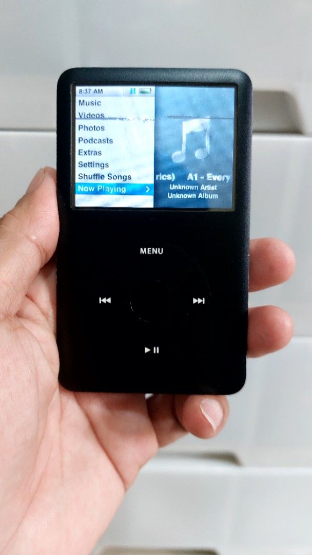 iPod Classic 6th Gen. 120GB Black (Category: Portable Music Players) located in Quezon City. Submitted by christopher.torio18 (Listing ID 1464874341, Image 1). Description: iPod Classic 6th Generation Storage Capacity: 120GB Black front, polished metal back Fully working, powers on, and displays menus and storage info correctly Controls: Click wheel is 100% operational Flaws: Heavy scratching on the metal backplate from normal pocket use Same ime