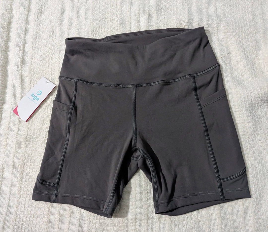 Iuga Athletic Shorts with Pockets Dark Grey Size M (Category: Activewear) located in Iba. Submitted by leovincee.1414 (Listing ID 1464816104, Image 3). Description: - Brand: Iuga Athletic Shorts - Color: Dark Grey - Size: Medium (M) - Condition: Brand new with original store tag attached - Material: 80% Nylon, 20% Spandex (soft & stretchy) - Features: High waist design, functional side pockets, and a back waistband pocket - Best for: Gym workouts