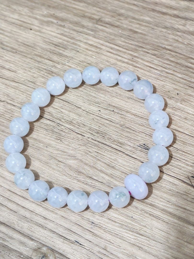 Jadeite Bracelet (Category: Precious Stones) located in Bacoor. Submitted by jadeitemaster (Listing ID 1464799377, Image 3). Description: Jadeite bracelet floating and lavander beads. This is icy, used purple rope, icy floating combined with lavander as center bead. This is customized by me, MasterJade, With 2 certificate for floating beads and the purple bead. 45K for thia is very cheap!!! Super deal price! If you are jade collector, you know! O