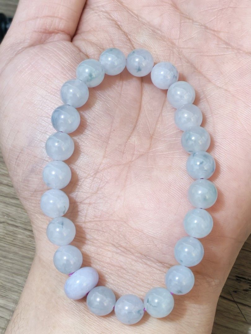 Jadeite Bracelet (Category: Precious Stones) located in Bacoor. Submitted by jadeitemaster (Listing ID 1464799377, Image 2). Description: Jadeite bracelet floating and lavander beads. This is icy, used purple rope, icy floating combined with lavander as center bead. This is customized by me, MasterJade, With 2 certificate for floating beads and the purple bead. 45K for thia is very cheap!!! Super deal price! If you are jade collector, you know! O