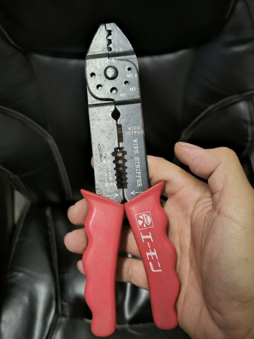Japan Amon Wire Stripper and Crimping Tool (Category: Home Improvement Tools & Accessories) located in Angeles City. Submitted by yellowbrickstore (Listing ID 1464814957, Image 1). Description: - 3-in-1 electrical tool: wire stripper, wire cutter, and terminal crimper - Clearly marked metric sizes along the metal jaw for precision - Sturdy construction designed for heavy-duty tasks - Comfortable red grip handles for easy handling - Condition: Sho