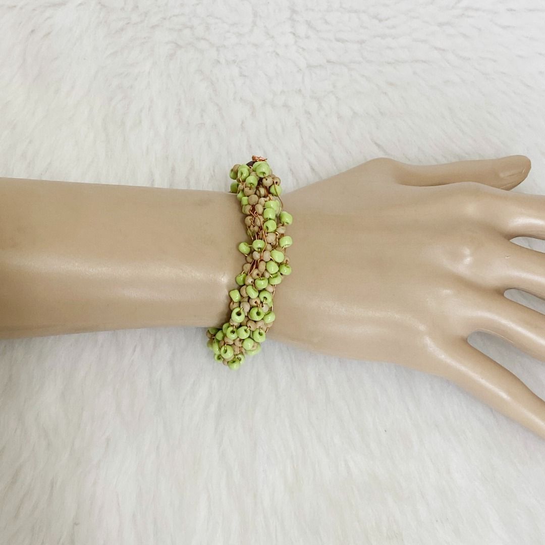 Japan Handmade Multi-Strand Lime Green Beads Copper Wire Bracelet (Category: Bracelets) located in Cebu City. Submitted by posh_avenue888 (Listing ID 1464930833, Image 1). Description: In very good condition. From Japan. 7 inches..