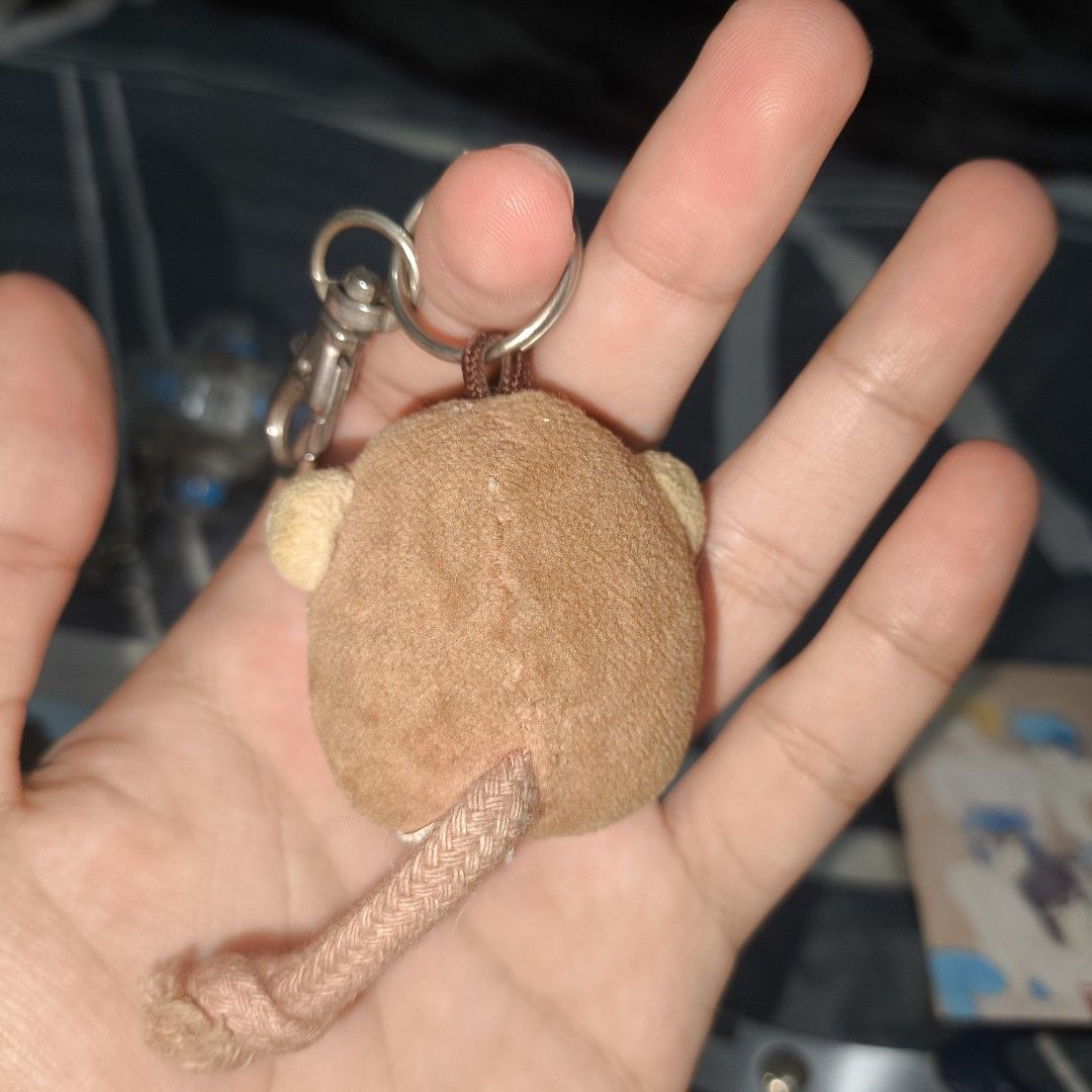 Jellycat Monkey Plush Keychain Bag Charm (Category: Plushies & Soft Toys) located in Quezon City. Submitted by boitresures (Listing ID 1464957248, Image 2). Description: NEED WASH / AS IS - Authentic Jellycat London monkey plush keychain - Super soft brown fuzzy body with cute embroidered face and rope tail - Secure metal lobster clasp and keyring attached - Original Jellycat London tag intact on the back - Perfect accessory for keys, bags, and b