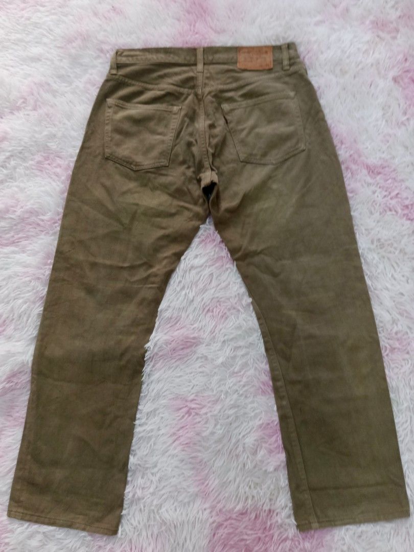 Johnbull Co. Ltd. Olive Green Cotton Pants Size 34 (Category: Trousers) located in Jolo. Submitted by zah-zah (Listing ID 1464790421, Image 2). Description: - Brand/Origin: Johnbull Co. Ltd. from Kojima, Japan - Material: 100% cotton heavy twill in an earthy olive green - Size: Tagged Size 34 - Features: Button fly closure, front and back pockets, stylish leather back patch - Condition/Style: Solid staple piece, perfect for everyday casual wear.