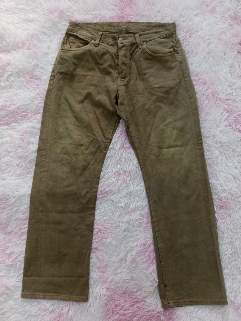 Johnbull Co. Ltd. Olive Green Cotton Pants Size 34 (Category: Trousers) located in Jolo. Submitted by zah-zah (Listing ID 1464790421, Image 1). Description: - Brand/Origin: Johnbull Co. Ltd. from Kojima, Japan - Material: 100% cotton heavy twill in an earthy olive green - Size: Tagged Size 34 - Features: Button fly closure, front and back pockets, stylish leather back patch - Condition/Style: Solid staple piece, perfect for everyday casual wear.