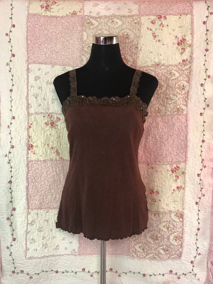 Jordace top (Category: Others Tops) located in Davao. Submitted by franz2004 (Listing ID 1464951173, Image 1). Description: Jordace chocobrown beaded top Size - XS Width - 15 Length - 19 (6.5 strap) Issues - None Color rate - 9.5/10 Condition - Very good 149 + sf.