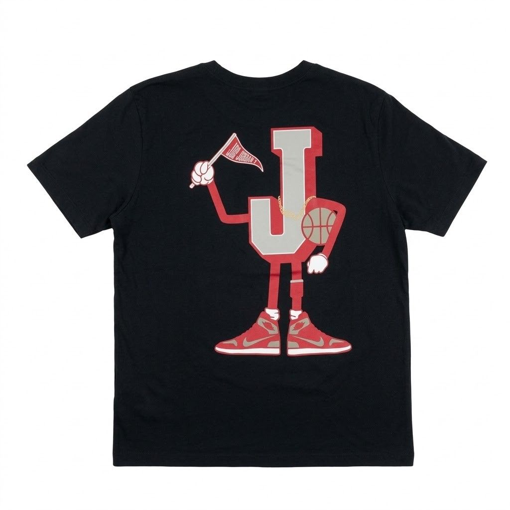 Jordan Black Graphic Tee (Category: Tshirts & Polo Shirts ) located in Manila. Submitted by youngturtle.8e129a (Listing ID 1464966442, Image 2). Description: Black short-sleeve t-shirt from Jordan. Small pennant logo on the chest, red Jumpman silhouette on the left sleeve. Large graphic on the back featuring a cartoon character made of the letter J wearing retro sneakers, holding a pennant and basketball. Ribbed crew neck collar..