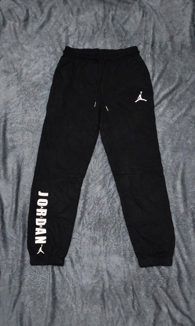 Jordan Sweat Pants (Category: Joggers) located in Caloocan City. Submitted by cogeothriftapparel (Listing ID 1464774044, Image 1). Description: Jordan Sweatpants Featuring a white Jumpman logo on the upper left thigh and bold vertical "JORDAN" lettering along the lower right leg. Materials: Cotton Size in inches: Waist: 28 Relax Stretch To 32 Lenght: 38 Condition: Excellent Price: 650 plus shipping Fee Disclaimer: This item/piece is thrifted, man