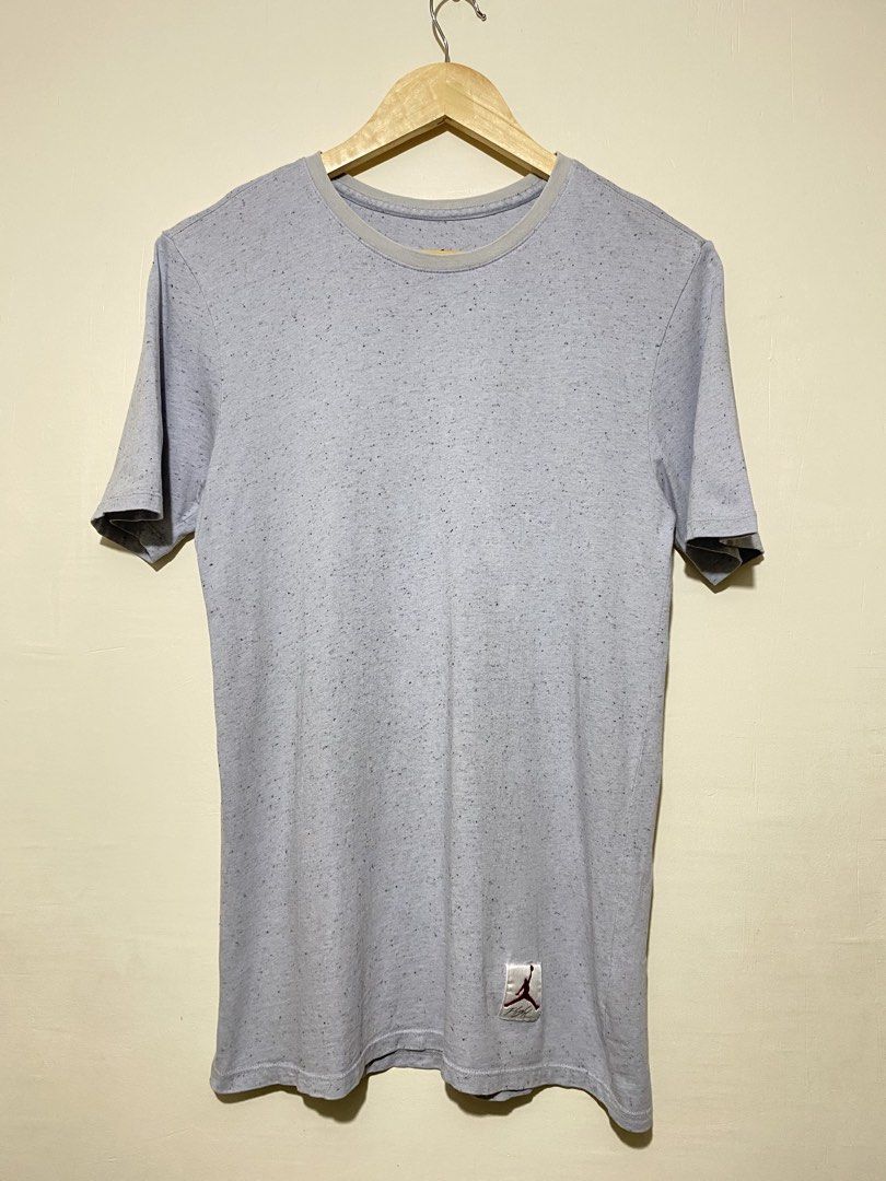 JORDAN, T-shirt (Category: Tshirts & Polo Shirts ) located in Cavite. Submitted by jc_thrift95 (Listing ID 1464829411, Image 1). Description: - a Jordan 4 Speckled Cement T-Shirt in wolf gray, highlighted by its signature all-over speckled pattern and the classic Jordan Flight patch near the lower. - L- 28 inch - W- 17.5 inch - Color rate 8/10 - See pictures details for dimes. .