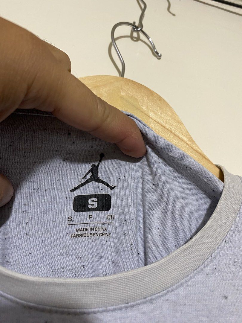 JORDAN, T-shirt (Category: Tshirts & Polo Shirts ) located in Cavite. Submitted by jc_thrift95 (Listing ID 1464829411, Image 3). Description: - a Jordan 4 Speckled Cement T-Shirt in wolf gray, highlighted by its signature all-over speckled pattern and the classic Jordan Flight patch near the lower. - L- 28 inch - W- 17.5 inch - Color rate 8/10 - See pictures details for dimes. .