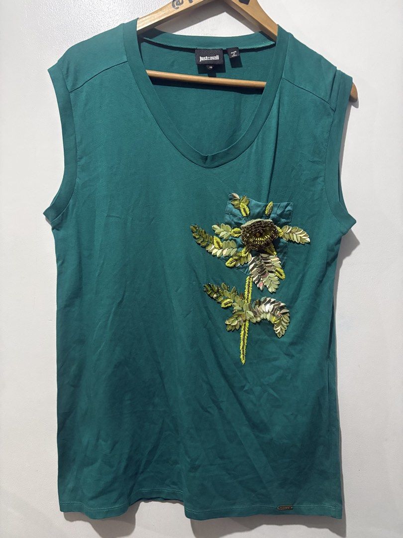 Just Cavalli Flower Pocket top (Category: Sleeveless) located in Makati City. Submitted by ThriftedGoods (Listing ID 1464858314, Image 2). Description: Feel free to ask for more detailed photos In excellent condition No issues Length-29 Width-21.