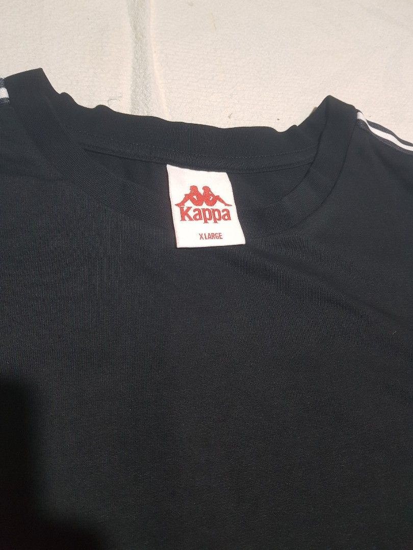 KAPPA Y2K BLACK TEE (Category: Tshirts & Polo Shirts ) located in Manila. Submitted by arttchive (Listing ID 1464928167, Image 2). Description: kappa Y2K black tee XL on tag Length: 28 Width: 25 Color rate: 9/10 Excellent condition ₱499.00+shipp Available✅.