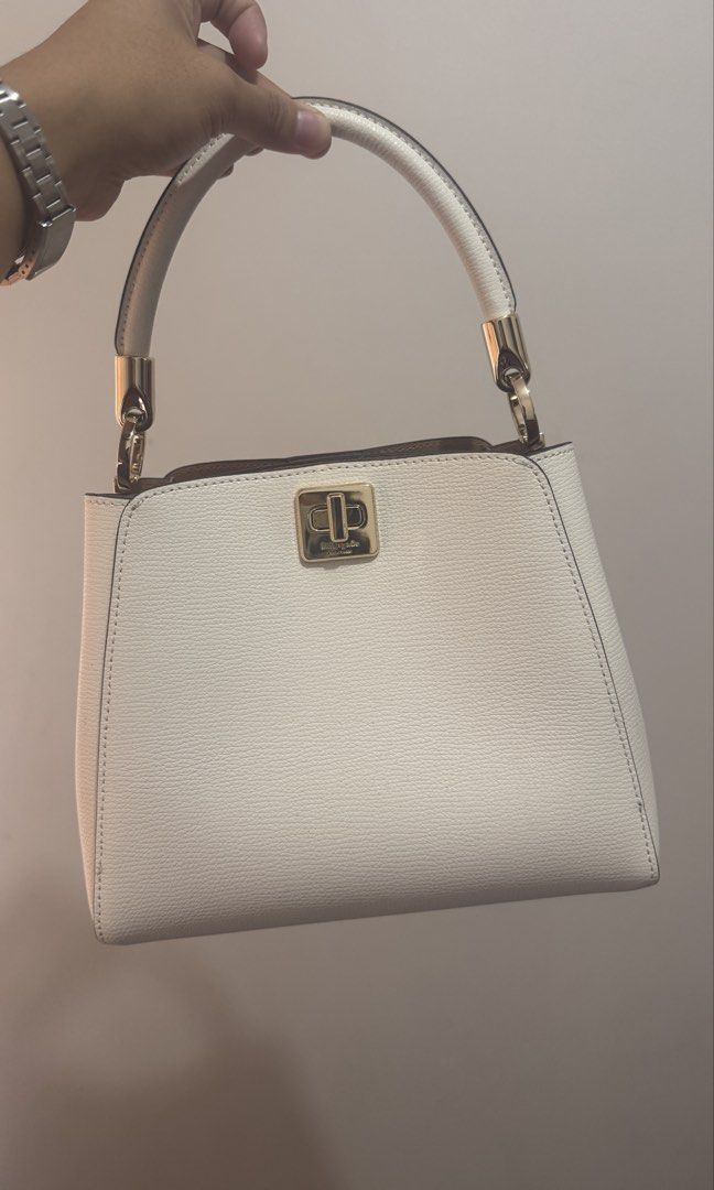 Kate Spade Phoebe Small Top Handle Bag (Category: Luxury Bags & Wallets) located in Imus. Submitted by jahnapilot (Listing ID 1464942822, Image 1). Description: AUTHENTIC Kate Spade Phoebe Small Top Handle Bag (KF553) - Pristine/Never Used • Color: Meringue; Size: Small • Condition: Brand New / Unused (No Tags/original dust bag) Comes with alternative dust bag • Description: Selling an authentic, never-been-used Kate Spade Phoebe Small Top Handle