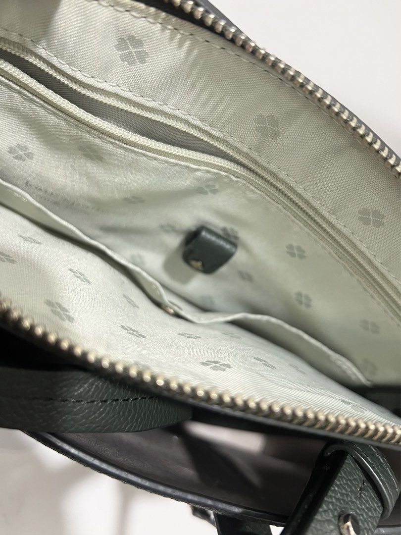 KATE SPADE SLING/HAND BAG (Category: Cross-body Bags) located in Manila. Submitted by heysugarstitch (Listing ID 1464924676, Image 3). Description: PRELOVED KATE SPADE MARGAUX MEDIUM DEEP GREEN PEBBLED LEATHER SATCHEL BAG WITH CARE CARD. Can pass as NEW! No flaws at all. No scratches, crisp and in excellent condition. Very clean lining, interior, and hardware. Such a STEAL!!.