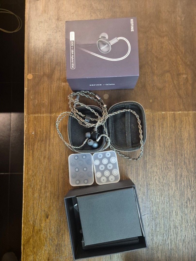 Kefine Quatio 2DD + 2BA Hybrid IEM (Category: Earphones) located in Quezon City. Submitted by rafaelrosa (Listing ID 1464792500, Image 3). Description: Kefine Quatio hybrid IEMs. 2 dynamic drivers and 2 balanced armature drivers setup. Includes detachable braided cable, zipped carrying case, and two organizers packed with multiple pairs of silicone ear tips in different sizes and colors. Original outer and inner boxes included..