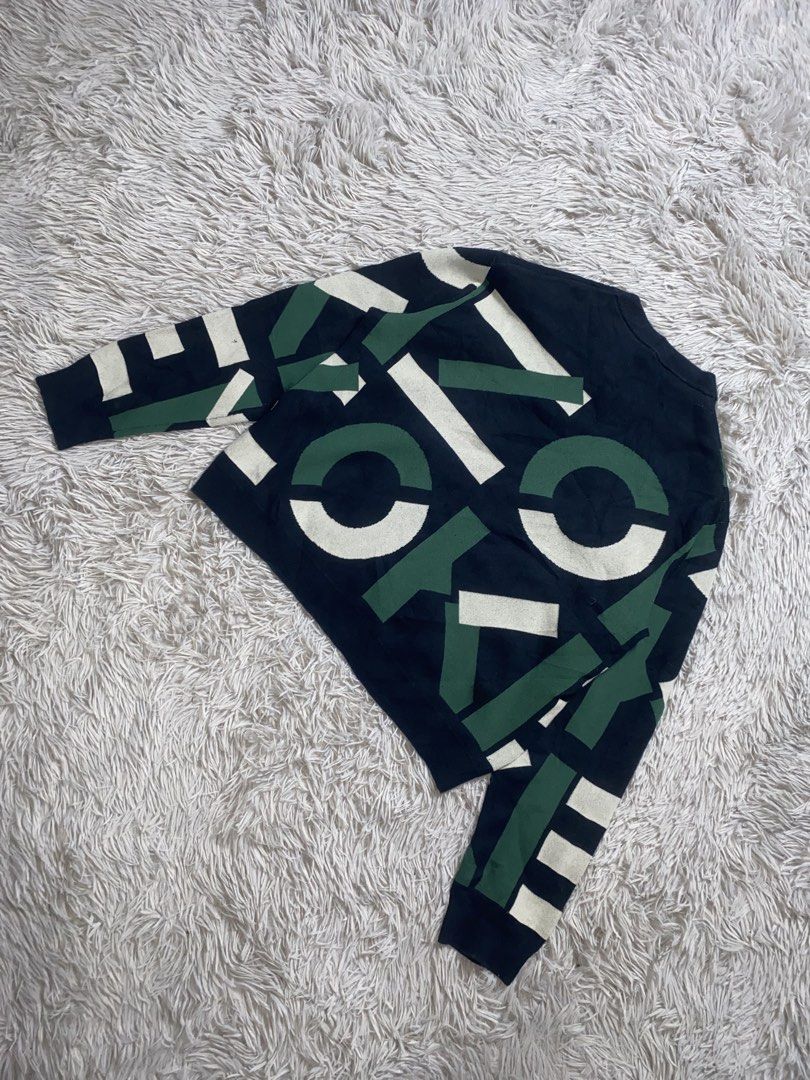 Kenzo Graphic Print Crew Neck Sweater (Category: Coats, Jackets and Outerwear) located in Sibulan. Submitted by hunt_mafia (Listing ID 1464816991, Image 3). Description: Kenzo Graphic Print Crew Neck Sweater Size M Width 21.5 Length 21 Sleeve length 22.5 Excellent condition Free vouch for safe transaction Unli video call with item Price: 2k+sf Loc: Negros Oriental.