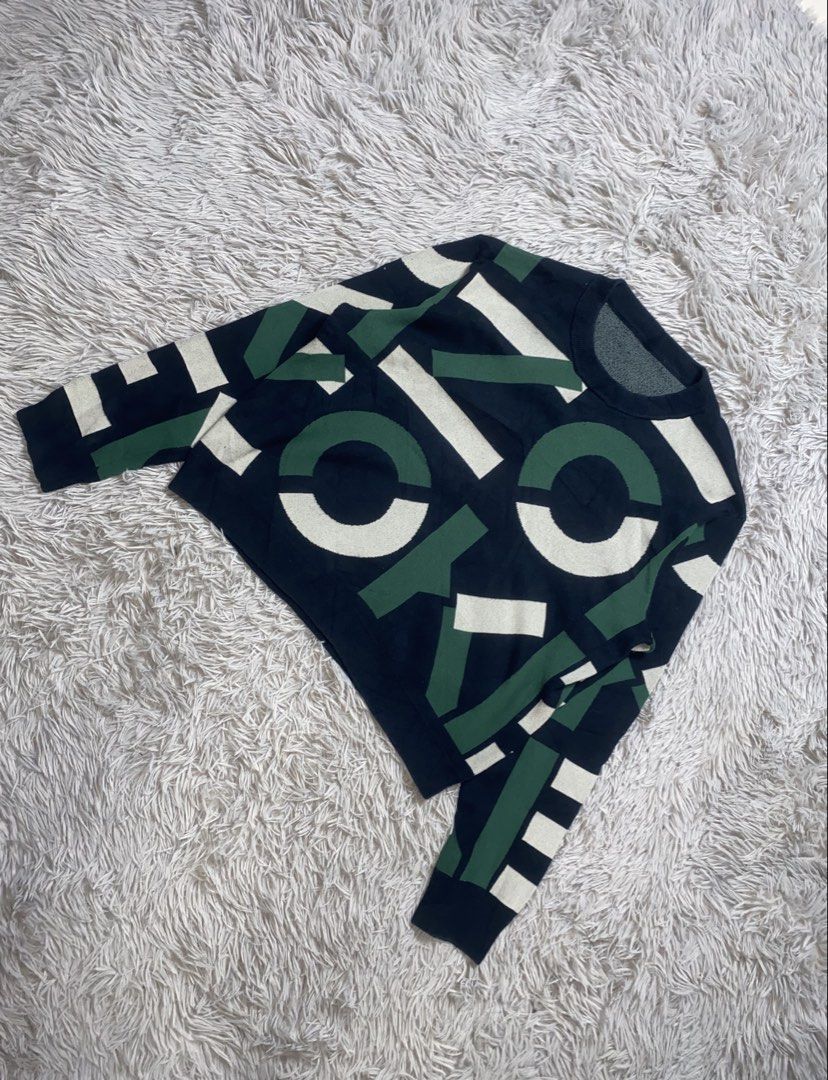 Kenzo Graphic Print Crew Neck Sweater (Category: Coats, Jackets and Outerwear) located in Sibulan. Submitted by hunt_mafia (Listing ID 1464816991, Image 2). Description: Kenzo Graphic Print Crew Neck Sweater Size M Width 21.5 Length 21 Sleeve length 22.5 Excellent condition Free vouch for safe transaction Unli video call with item Price: 2k+sf Loc: Negros Oriental.