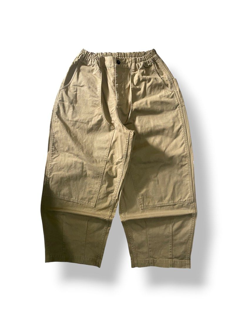 Khaki Dknee Balloon Pants (Category: Trousers) located in Mendez-Nunez. Submitted by leighthrift (Listing ID 1464894359, Image 1). Description: BALLOON KHAKI DKNEE PANTS WAIST: FREE LENGTH: 39A THIGH: 16 HEM: 10 SUPER HARD X HEAVY CRISPY CONDITION NEED WASH ONLY - Color: Khaki / Solid Tan - Fit: Relaxed, wide-leg style - Waist: Elastic back with secure button closure and zip fly - Pockets: Deep side pockets - Details: Trendy paneled knee construc