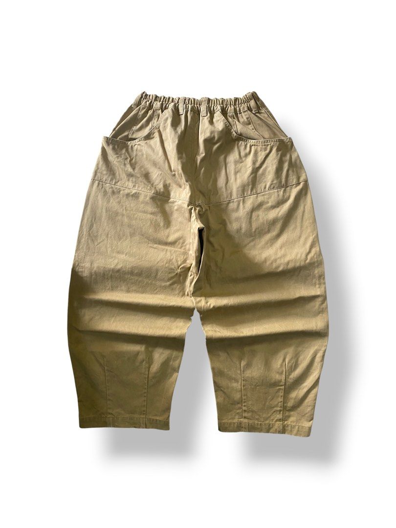 Khaki Dknee Balloon Pants (Category: Trousers) located in Mendez-Nunez. Submitted by leighthrift (Listing ID 1464894359, Image 2). Description: BALLOON KHAKI DKNEE PANTS WAIST: FREE LENGTH: 39A THIGH: 16 HEM: 10 SUPER HARD X HEAVY CRISPY CONDITION NEED WASH ONLY - Color: Khaki / Solid Tan - Fit: Relaxed, wide-leg style - Waist: Elastic back with secure button closure and zip fly - Pockets: Deep side pockets - Details: Trendy paneled knee construc