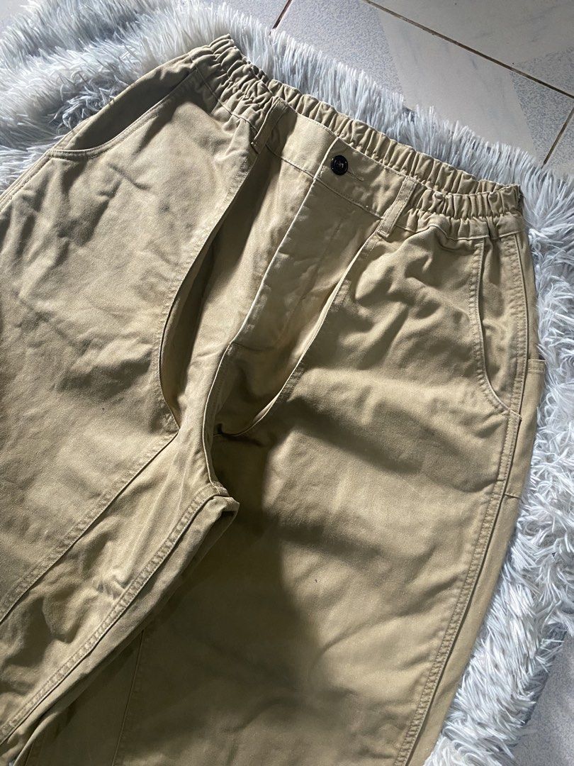 Khaki Dknee Balloon Pants (Category: Trousers) located in Mendez-Nunez. Submitted by leighthrift (Listing ID 1464894359, Image 3). Description: BALLOON KHAKI DKNEE PANTS WAIST: FREE LENGTH: 39A THIGH: 16 HEM: 10 SUPER HARD X HEAVY CRISPY CONDITION NEED WASH ONLY - Color: Khaki / Solid Tan - Fit: Relaxed, wide-leg style - Waist: Elastic back with secure button closure and zip fly - Pockets: Deep side pockets - Details: Trendy paneled knee construc