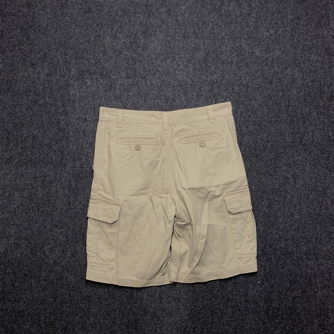 Khaki Cargo Shorts Men Casual Utility Pockets (Category: Shorts) located in Imus. Submitted by la.wigginss0 (Listing ID 1464805802, Image 3). Description: - Classic khaki cargo shorts made from durable solid cotton twill - Multiple side and back pockets for convenient everyday carry (EDC) - Secure button fly closure and standard belt loops - Versatile neutral beige tone pairs effortlessly with t-shirts and polos.