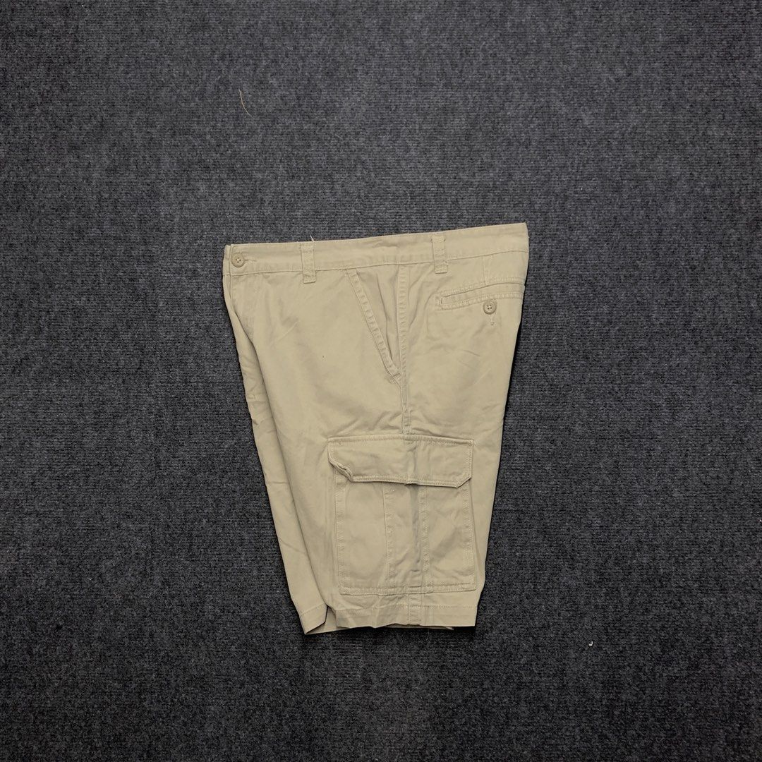 Khaki Cargo Shorts Men Casual Utility Pockets (Category: Shorts) located in Imus. Submitted by la.wigginss0 (Listing ID 1464805802, Image 2). Description: - Classic khaki cargo shorts made from durable solid cotton twill - Multiple side and back pockets for convenient everyday carry (EDC) - Secure button fly closure and standard belt loops - Versatile neutral beige tone pairs effortlessly with t-shirts and polos.
