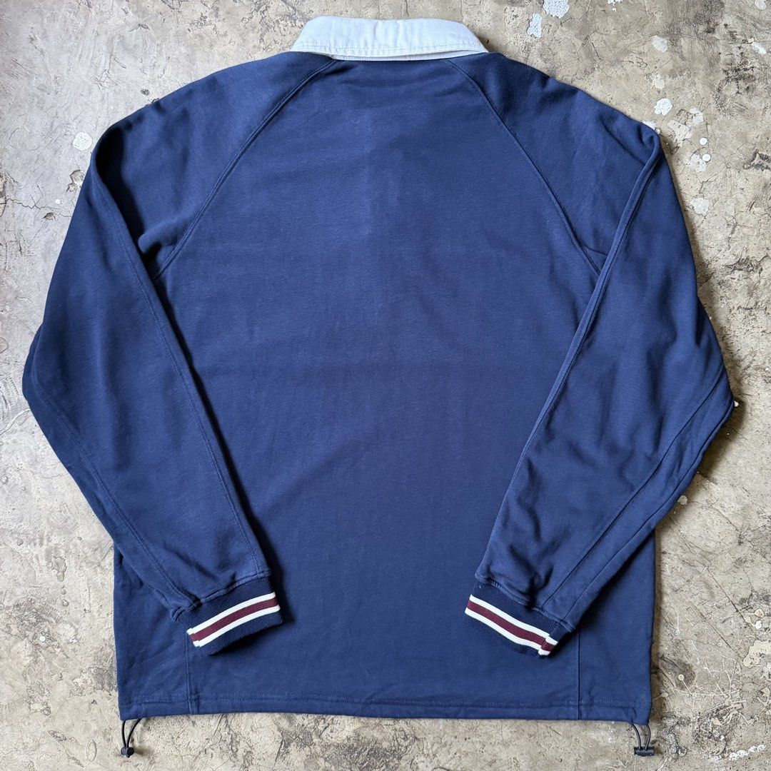 Kith - Wilson - Rugby Collared L/S (Category: Tshirts & Polo Shirts ) located in Cavite. Submitted by 4118.ph (Listing ID 1464871683, Image 2). Description: Large 9/10 condition Minor yellow on neckline Width 24” Length 28”.