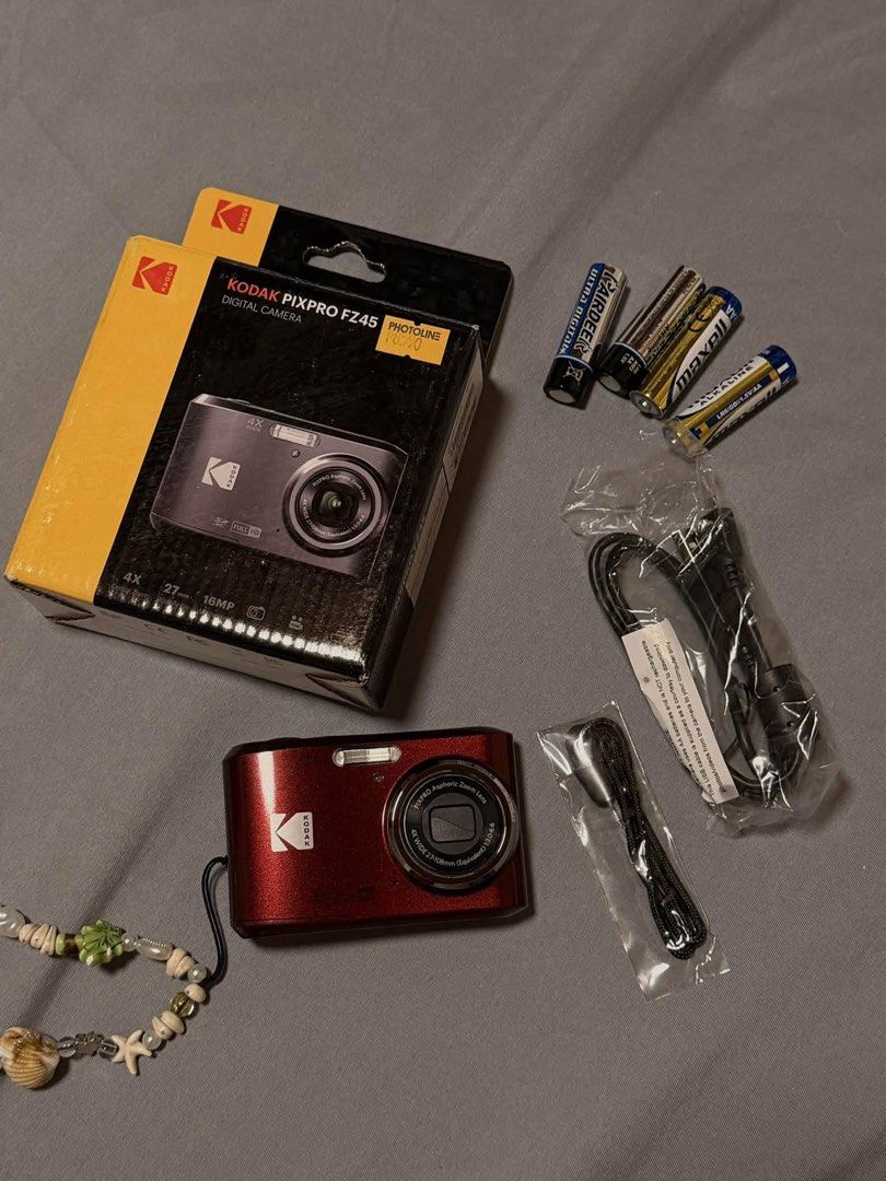Kodak PixPro FZ45 Red Digital Camera (Category: Cameras) located in San Fernando. Submitted by margethebarista (Listing ID 1464819148, Image 2). Description: 📍La Union meet up/lbc unli videocall/ unli test - Model: Red Kodak PixPro FZ45 Digital Camera - Condition: Tested and works great - Included: Original box, USB cable, wrist strap, spare batteries, and a 64GB SanDisk Ultra SD card - Perfect for upcoming trips and casual outings - Message for