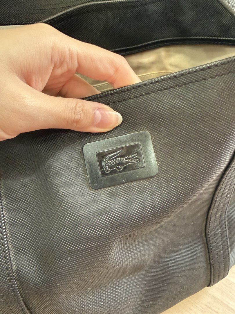 Lacoste Black Canvas Tote Bag (Category: Tote Bags) located in Manila. Submitted by elisesnts (Listing ID 1464839650, Image 2). Description: Black Lacoste tote bag Condition: well used, needs cleaning RFS: dont use anymore.