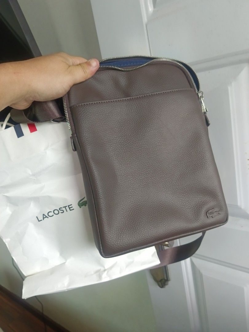 Lacoste Brown Leather Crossbody Bag (Category: Sling Bags) located in Mandaluyong City. Submitted by ralfmadrilejos (Listing ID 1464795868, Image 1). Description: - Authentic Lacoste crossbody bag in brown pebbled leather brand new! pick up or shipping only Lancaster general trias lalamove or shipping only pass sa barat brand new ito rfs too many bags.