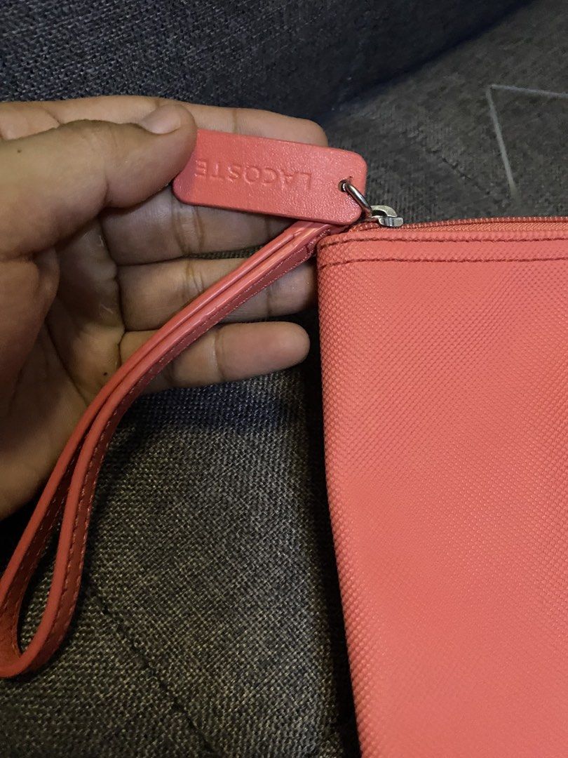 Lacoste clutch (Category: Luxury Bags & Wallets) located in Caloocan City. Submitted by luxurymurayta888 (Listing ID 1464856569, Image 3). Description: need clean.