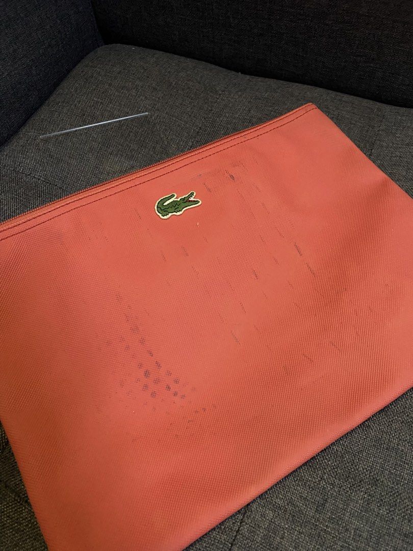 Lacoste clutch (Category: Luxury Bags & Wallets) located in Caloocan City. Submitted by luxurymurayta888 (Listing ID 1464856569, Image 2). Description: need clean.