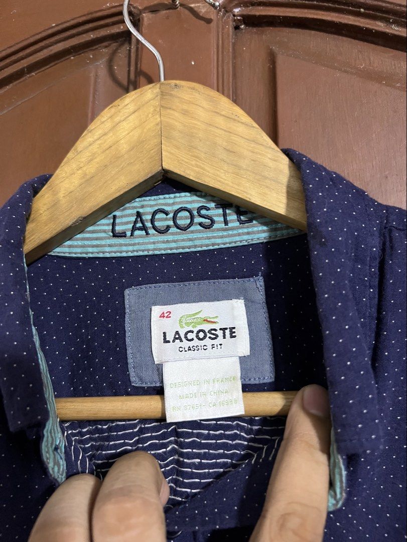 Lacoste Navy Blue Button Down Longsleeves (Category: Tshirts & Polo Shirts ) located in Manila. Submitted by thriftpoint99 (Listing ID 1464888495, Image 2). Description: 21.5x26.5-29.5 No issue Excellent condition.