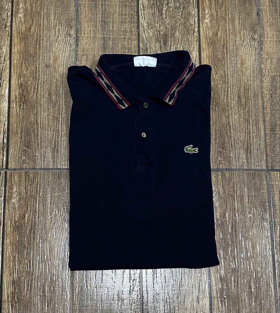 LACOSTE NAVY BLUE POLO (Category: Tshirts & Polo Shirts ) located in Manila. Submitted by urban-vintage_2 (Listing ID 1464929622, Image 1). Description: ISSUE: SEE THE PICS FOR ISSUE ( NEED WASH ) MOP :GCASH ( NO COD ) SHIP VIA : LALAMOVE & J&T LOCATION : PASIG CITY LENGTH : 32 WIDTH : 24 .