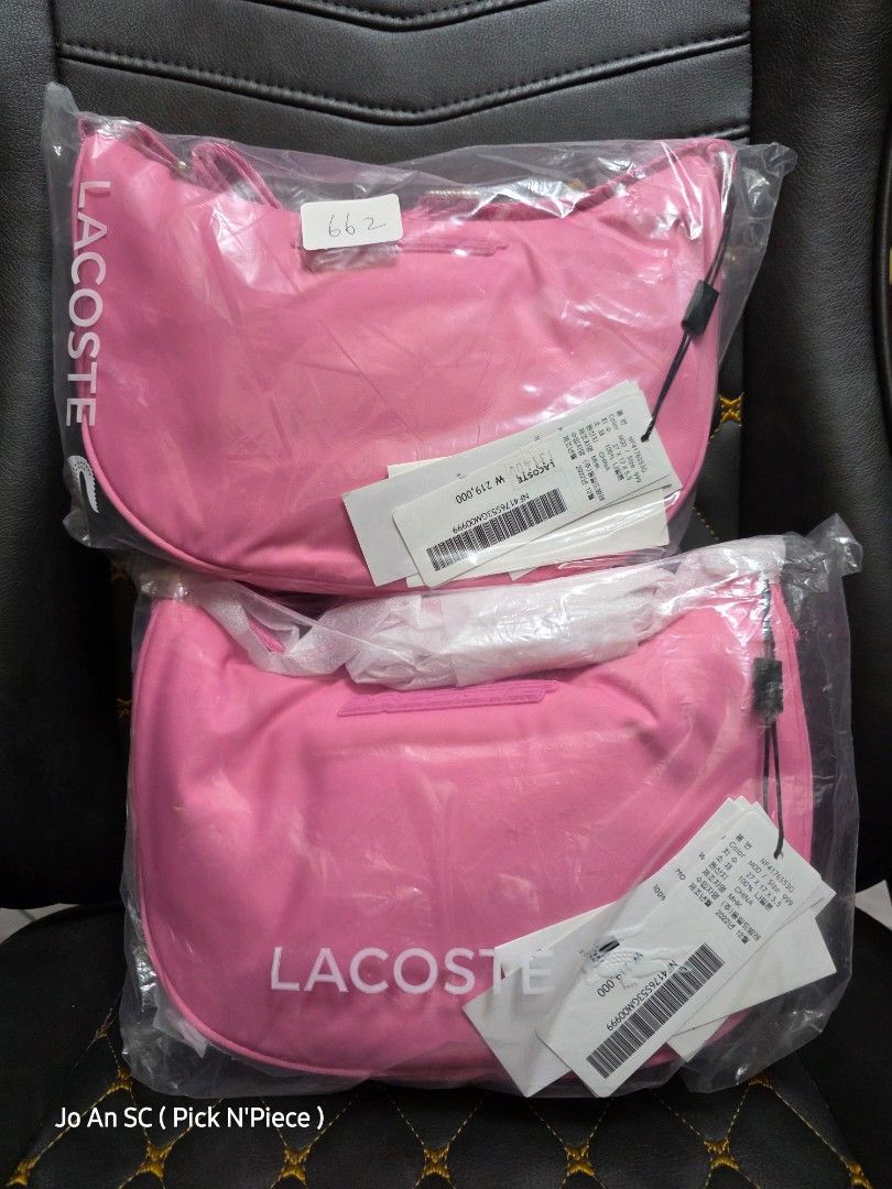 LACOSTE PINK-NYLON CROSSBODY BAG (Category: Luxury Bags & Wallets) located in Quezon City. Submitted by joansc (Listing ID 1464945740, Image 2). Description: SOURCED: SOUTH KOREA 100% ORIGINAL ONLY W/TAG, POLYPLASTIC.