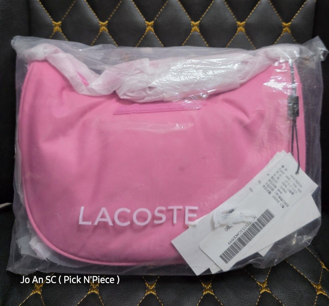 LACOSTE PINK-NYLON CROSSBODY BAG (Category: Luxury Bags & Wallets) located in Quezon City. Submitted by joansc (Listing ID 1464945740, Image 3). Description: SOURCED: SOUTH KOREA 100% ORIGINAL ONLY W/TAG, POLYPLASTIC.
