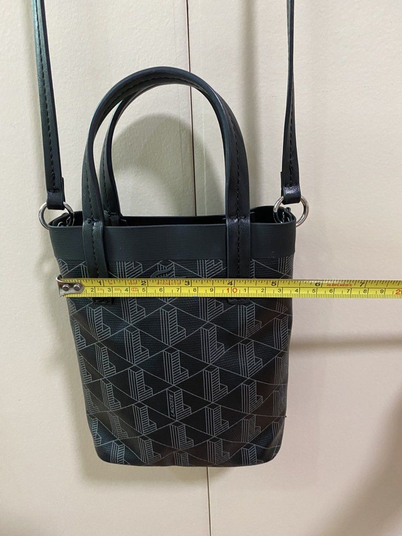 Lacoste Zely Canvas Monogram mini tote (preloved) (Category: Luxury Bags & Wallets) located in San Juan City. Submitted by rostorres (Listing ID 1464817279, Image 3). Description: LAST PRICE posted, no more haggling please 🙏 Item is original, bought from official online store. No issues, please check photos for more details 🙂 Style: Mini bucket bag in black with geometric L monogram pattern Dual top handles, long NOT adjustable and NOT detachab