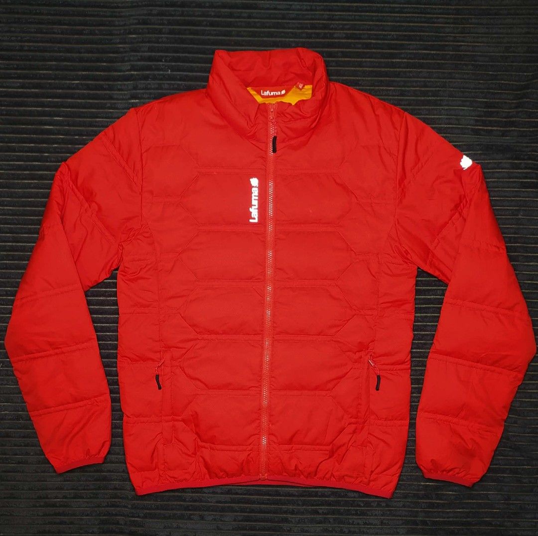 Lafuma 550 Fill Power Red Puffer Jacket (Category: Coats, Jackets and Outerwear) located in Manila. Submitted by norathrifted (Listing ID 1464803829, Image 1). Description: - Brand/Model: Lafuma Puffer Jacket - Color: Vibrant red with bright yellow inner lining - Insulation: 550 fill power down (super warm and lightweight) - Size: M / 170 / 92A - Features: Full zip front, high collar, zippered side pockets, white chest branding - Condition: Excel