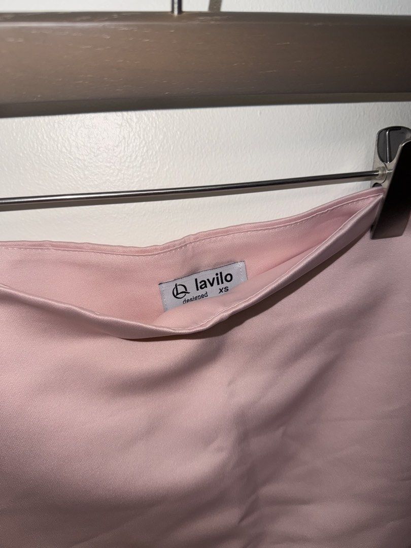 Lavilo Pink Skirt (Category: Skirts) located in Makati City. Submitted by epicdeer_3520cd (Listing ID 1464863266, Image 3). Description: * Brand: Lavilo * Size: XS * Color: Pink * Purchased in: Vietnam 🇻🇳 * Condition: Brand new — only fitted once * Also never worn out * No flaws or signs of wear * A-line mini skirt with built-in shorts underneath Measurements: • Waist: under 62 cm • Hips: under 86 cm • Length: 32 cm.