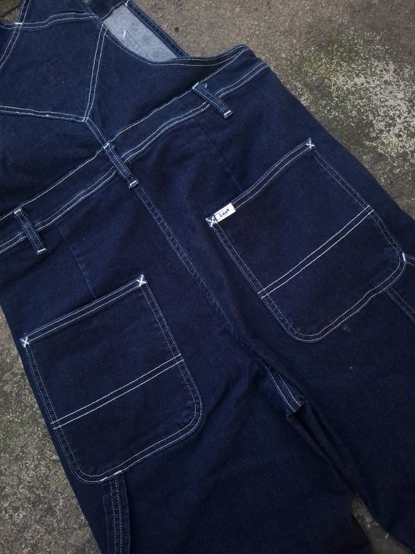 Lee Dark Indigo Overall Carpenter Jumper (Stretch) - Size : 32 (Category: Jeans) located in Manila. Submitted by bonaobrag55538 (Listing ID 1464845929, Image 3). Description: - Brand: Lee - Style: Dark indigo overall carpenter jumper with stretch fabric - Dimes: 32*48*7.5 - Material: 79% cotton, 16% polyester, 4% elastomultiester, 1% elastane - Details: Deep blue wash, contrast white stitching, multiple front and back pockets, side hammer loop - 