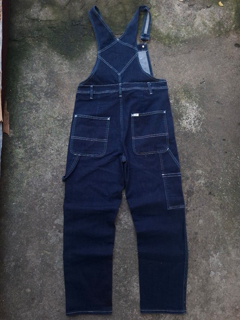 Lee Dark Indigo Overall Carpenter Jumper (Stretch) - Size : 32 (Category: Jeans) located in Manila. Submitted by bonaobrag55538 (Listing ID 1464845929, Image 2). Description: - Brand: Lee - Style: Dark indigo overall carpenter jumper with stretch fabric - Dimes: 32*48*7.5 - Material: 79% cotton, 16% polyester, 4% elastomultiester, 1% elastane - Details: Deep blue wash, contrast white stitching, multiple front and back pockets, side hammer loop - 