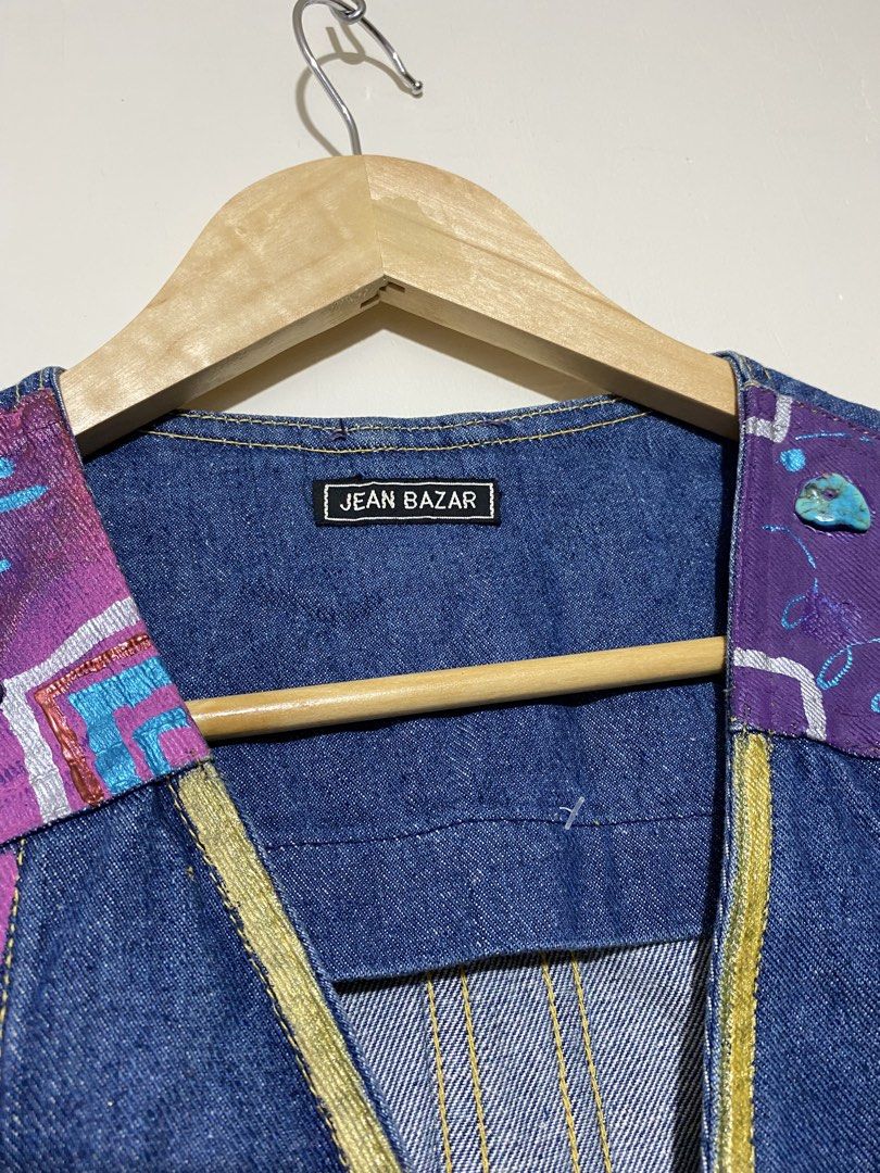 LEE,(Customize Denim vest) (Category: Coats, Jackets and Outerwear) located in Cavite. Submitted by jc_thrift95 (Listing ID 1464802392, Image 2). Description: - This vintage blue denim vest from Jean Bazar features eye-catching purple and turquoise patterned shoulder patches accented with decorative beading and metallic gold trim along the V-neckline. - L- 22.5 inch -W- 19 inch - Color rate 8/10 - See pictures details for dimes..