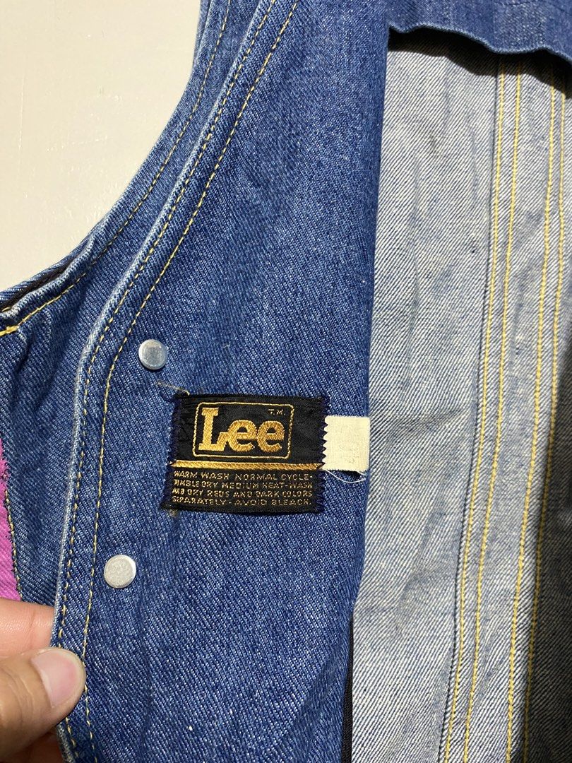 LEE,(Customize Denim vest) (Category: Coats, Jackets and Outerwear) located in Cavite. Submitted by jc_thrift95 (Listing ID 1464802392, Image 3). Description: - This vintage blue denim vest from Jean Bazar features eye-catching purple and turquoise patterned shoulder patches accented with decorative beading and metallic gold trim along the V-neckline. - L- 22.5 inch -W- 19 inch - Color rate 8/10 - See pictures details for dimes..