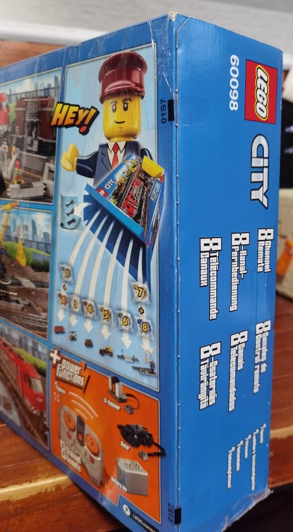 LEGO City Heavy-Haul Train 60098 (Category: Lego & Building Sets) located in Marikina City. Submitted by ericjannie1206 (Listing ID 1464769964, Image 3). Description: - LEGO City Heavy-Haul Train (Set 60098) - Recommended Age: 6-12 years old - Condition: Brand new, wrapped in original plastic shrink wrap - Includes: Motorized red locomotive, freight cars, crane, tracks, vehicles, and infrared remote control - Perfect for LEGO collectors and train