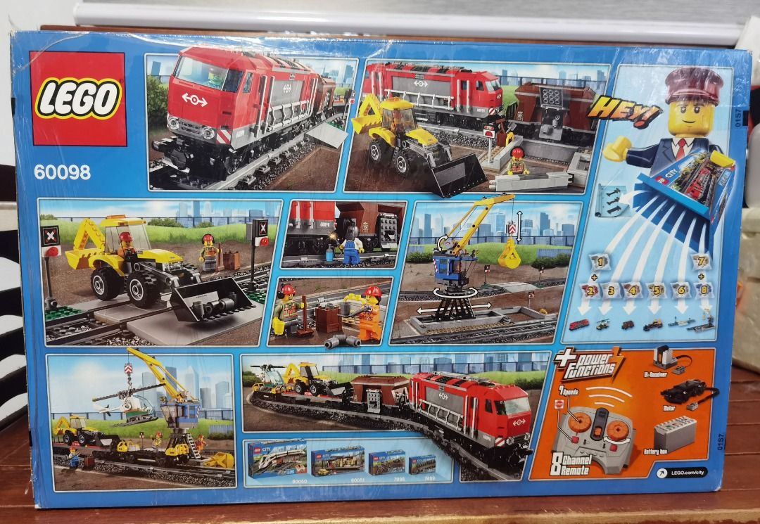 LEGO City Heavy-Haul Train 60098 (Category: Lego & Building Sets) located in Marikina City. Submitted by ericjannie1206 (Listing ID 1464769964, Image 2). Description: - LEGO City Heavy-Haul Train (Set 60098) - Recommended Age: 6-12 years old - Condition: Brand new, wrapped in original plastic shrink wrap - Includes: Motorized red locomotive, freight cars, crane, tracks, vehicles, and infrared remote control - Perfect for LEGO collectors and train